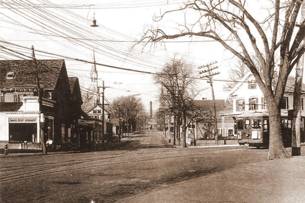 Upper Jackson Square before Korean Memorial. Daniel Reidy Druggist on left hand side was a long time Jackson Square business. Image provided by: Jodi Purdy-Quinlan, Vice Chairman of the Weymouth Historical Commission