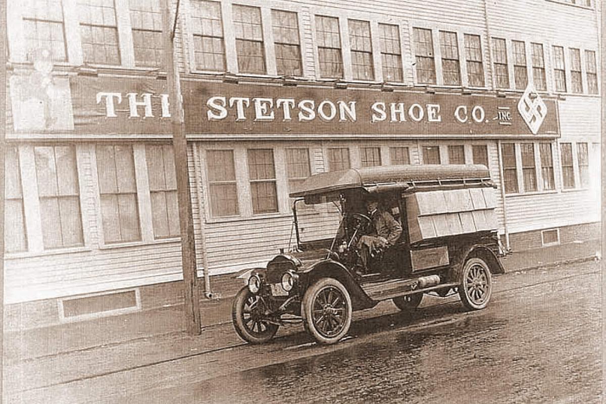 Photo of The Stetson Shoe Company Building and Delivery Truck. Stetson Shoes was one of a number of shoe factories in the town of Weymouth. The Stetson Shoe Company closed it's operations in 1973. The factory building has been converted to office space. Location is on Route 18 south of Route 3. Image provided by: Jodi Purdy-Quinlan, Vice Chairman of the Weymouth Historical Commission