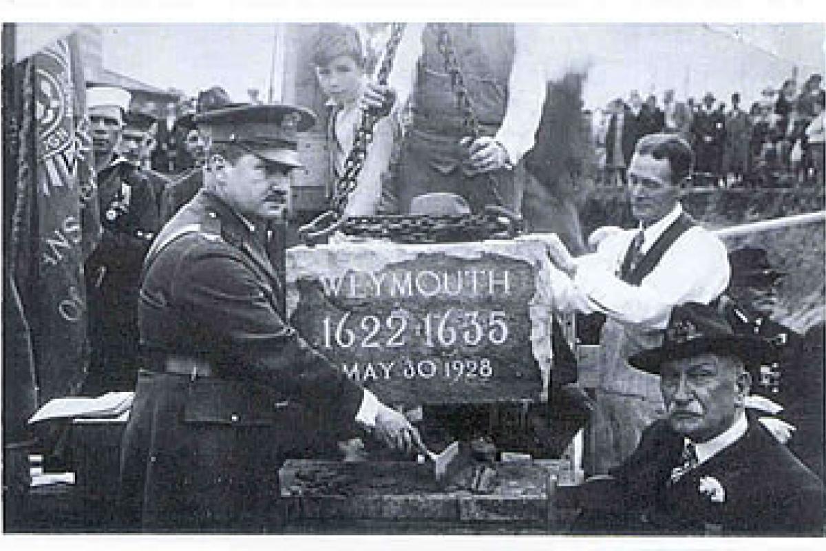 Photo of Corner Stone being placed on May 30 1928 of the current Weymouth Town Hall Building. The corner stone is made of local granite. Facing the building it is on the front right hand side. Image provided by Elizabeth Emde postcard collection.