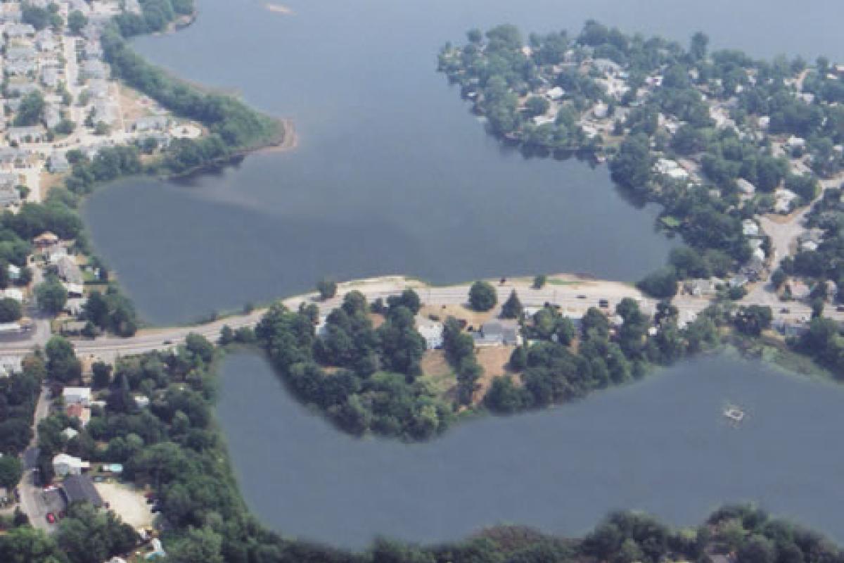 Aerial photo of site of Whitman's Pond, Middle Street in forground 2002.