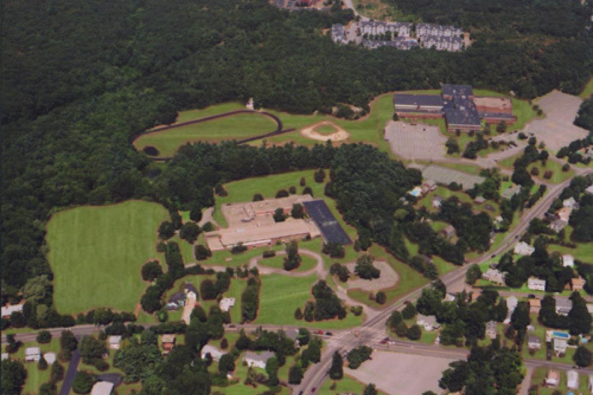 Aerial photo of South Intermediate School and The Pleasant Street High School Campus. The current plan is to demolish the South Intermediate School and add an addition to the existing High School Building at 360 Pleasant Street.