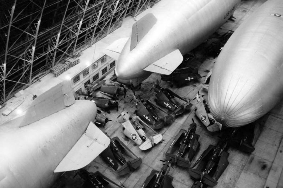 Collapsible planes stored beneath blimps at the Naval Air Station South Weymouth.  Source: Town of Weymouth